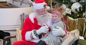 Santa and Child at Cottonwood Market